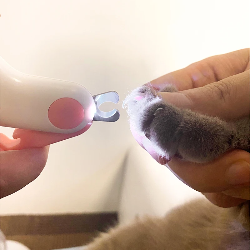 Cortadora de uñas con luz LED para perros y gatos, cortadora profesional de garras para mascotas con bloqueo de seguridad, Kit de herramientas de cuidado para cachorros y gatitos - imagen 4