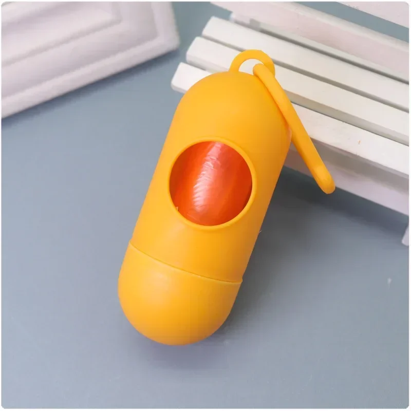 Dispensador con forma de píldora para bolsas de excrementos de perro, soporte para residuos de basura, herramienta de limpieza, productos para mascotas - imagen 3