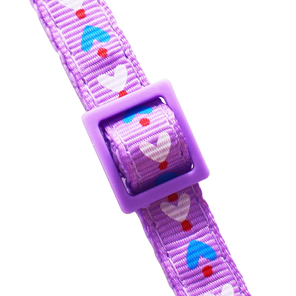 Lindo collar para mascotas de dibujos animados con campana: collar ajustable de nailon para perros y gatos con patrón de flecha de amor/pegada, diseño de hebilla de seguridad - imagen 3
