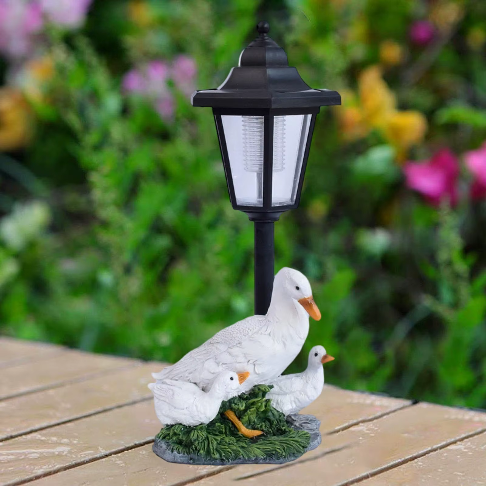 Estatua de pato en resina con luz solar para jardin exterior decorativo - imagen 3