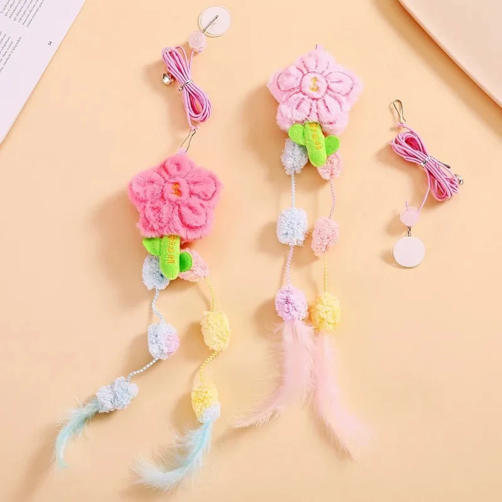 Juguete interactivo para gatos elástico con pluma, campana y colgante