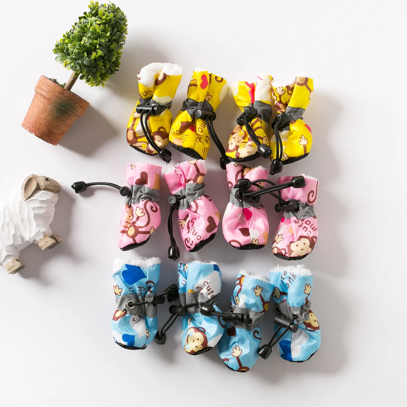 Botas para perros de 4 piezas, zapatos cálidos antideslizantes e impermeables para mascotas con forro polar para perros, protectores de patas para cachorros para nieve y lluvia