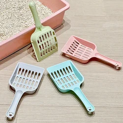 Pala de arena para gatos color caramelo con mango - utensilio estético