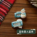 Blue snowman clip