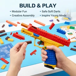 Pistola de juguete con disparo automático y bloques para niños
