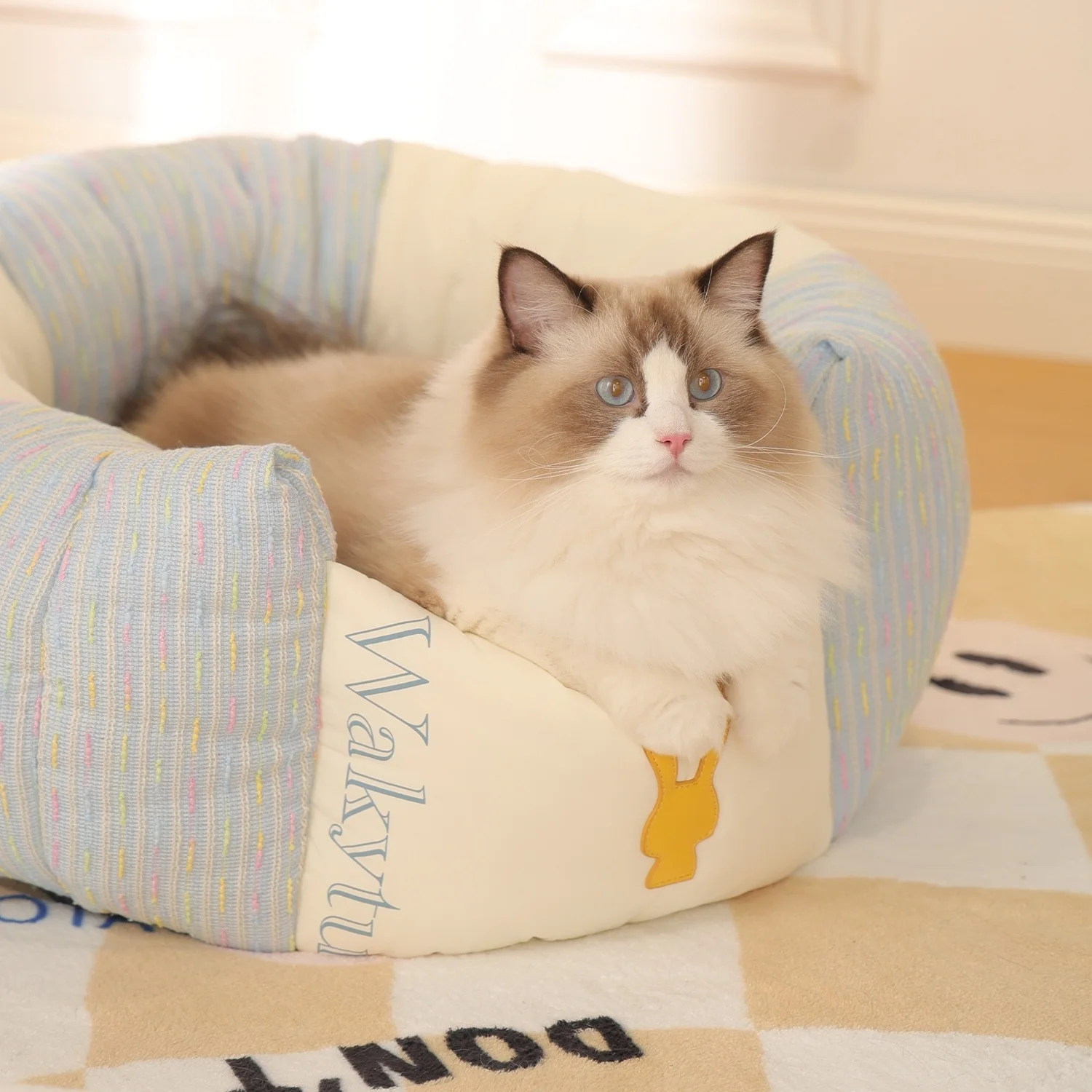 Cama para gatos en forma de donut de alta gama, fondo antideslizante, cama redonda con cojín para gatos y perros, camas para mascotas de lujo de tela súper suave y duradera - imagen 2