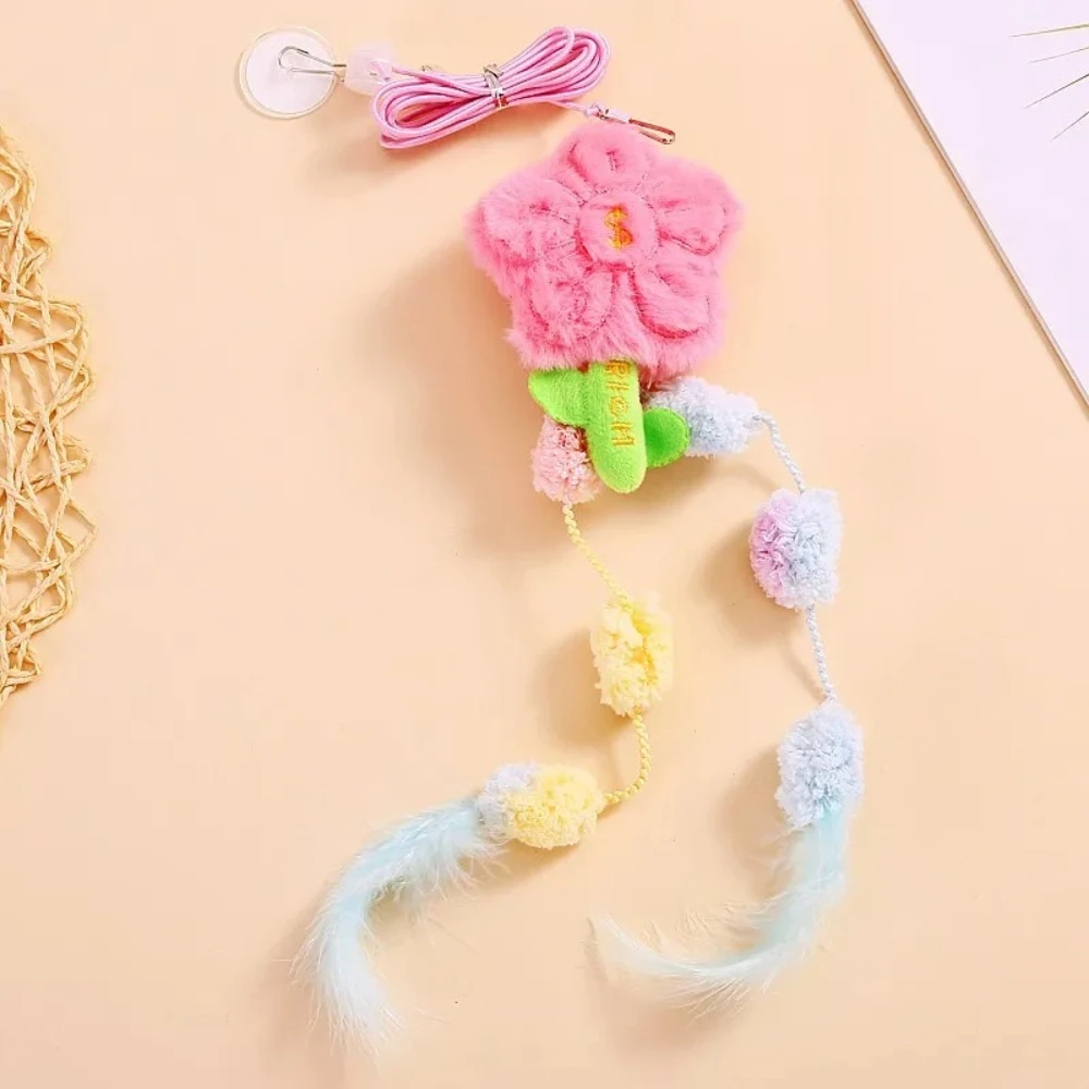 Juguete interactivo para gatos elástico con pluma, campana y colgante - imagen 4