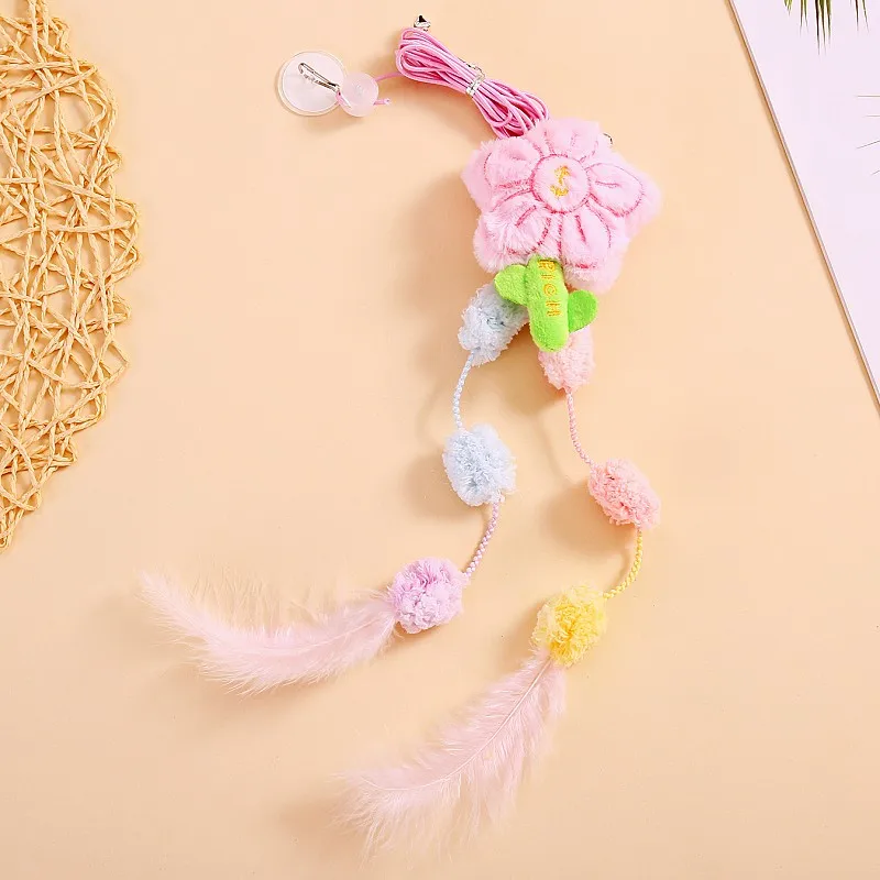 Juguete interactivo para gatos con plumas y campana - imagen 4