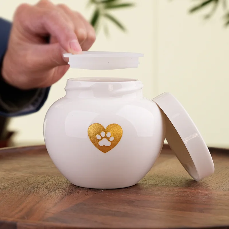 Urna pequeña para mascotas, tarro de cerámica con estampado de pata de gato, cubierta interior de silicona funeraria, ataúd de cerámica sellado a prueba de fugas, productos para recuerdos de mascotas - imagen 5