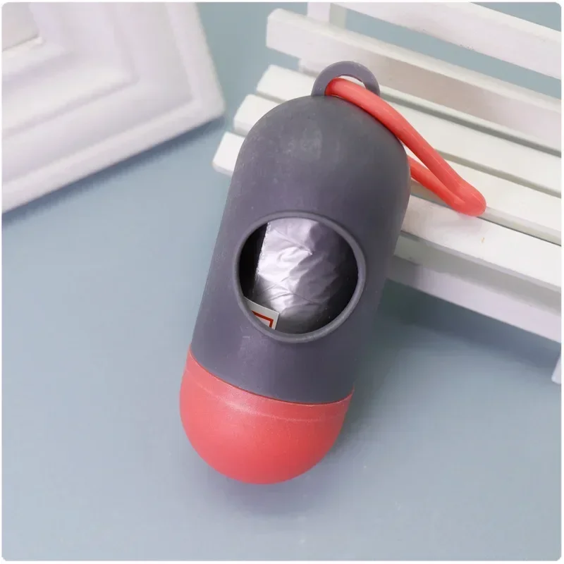 Dispensador con forma de píldora para bolsas de excrementos de perro, soporte para residuos de basura, herramienta de limpieza, productos para mascotas - imagen 2