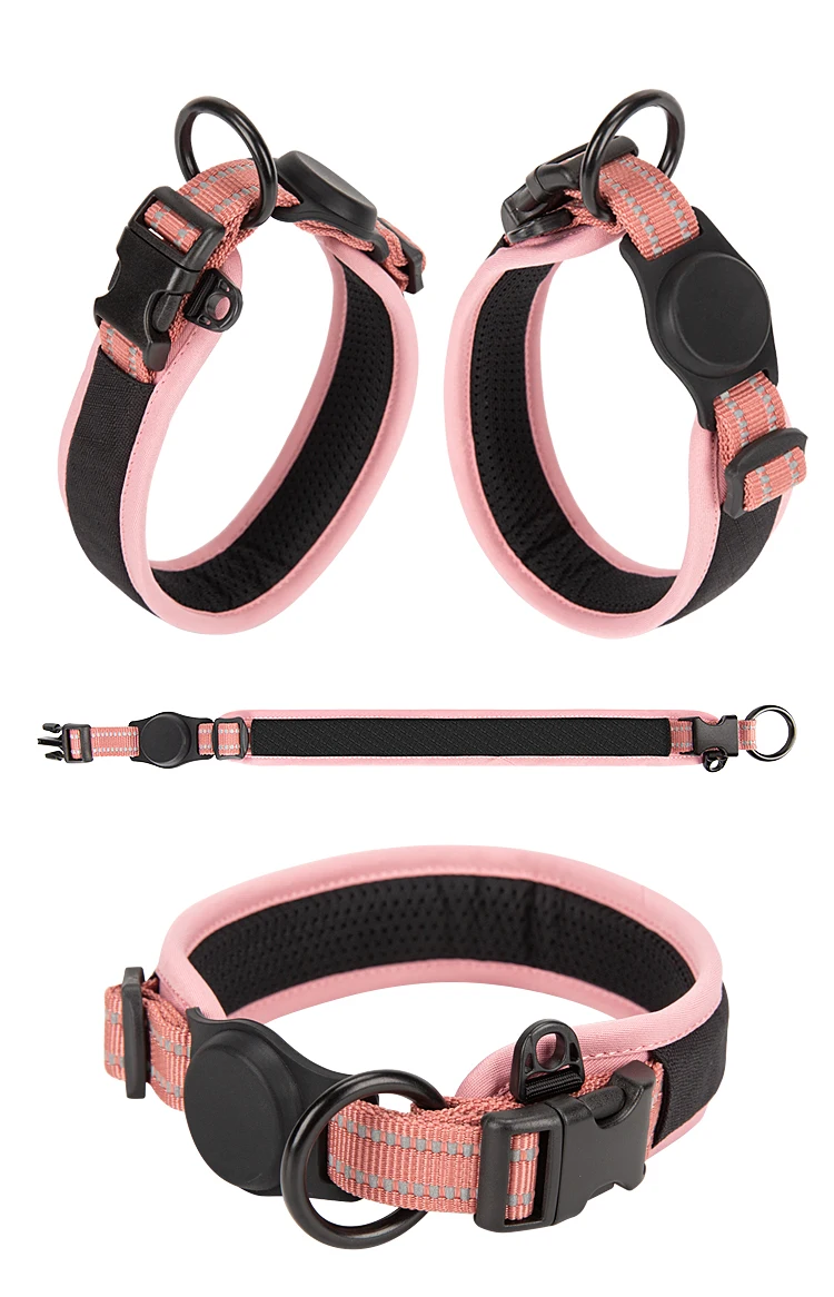 Un collar de perro rosa y negro con una correa adjunta