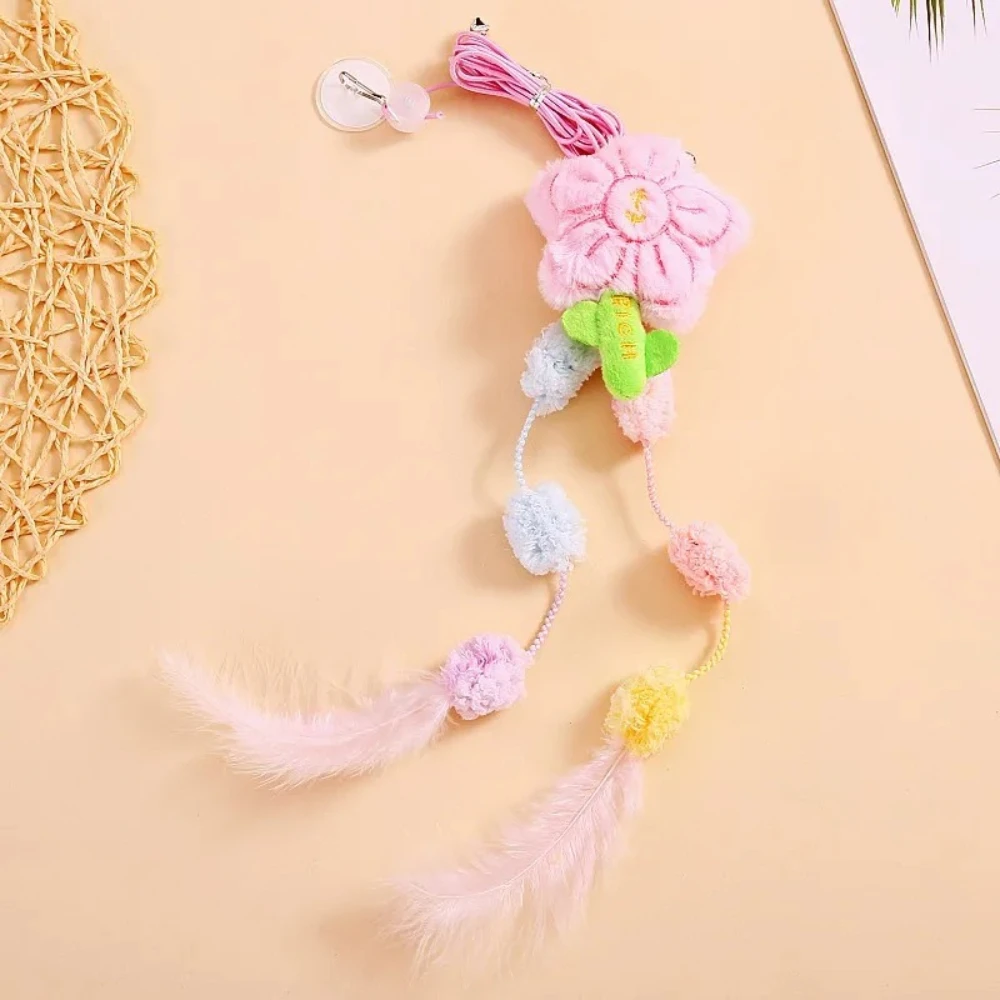 Juguete interactivo para gatos elástico con pluma, campana y colgante - imagen 5