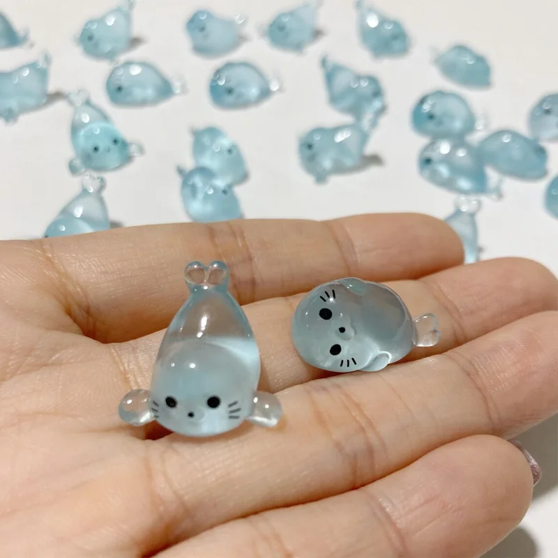 Figuras de focas que brillan en la oscuridad – Miniaturas decorativas de resina - imagen 2