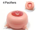 Pink four pacifiers