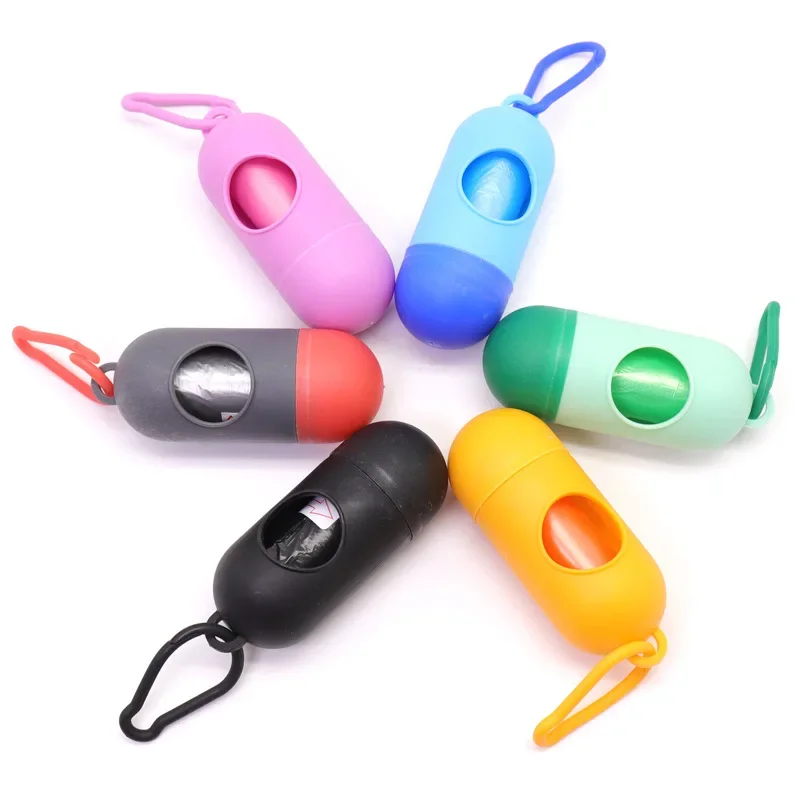 Dispensador con forma de píldora para bolsas de excrementos de perro, soporte para residuos de basura, herramienta de limpieza, productos para mascotas