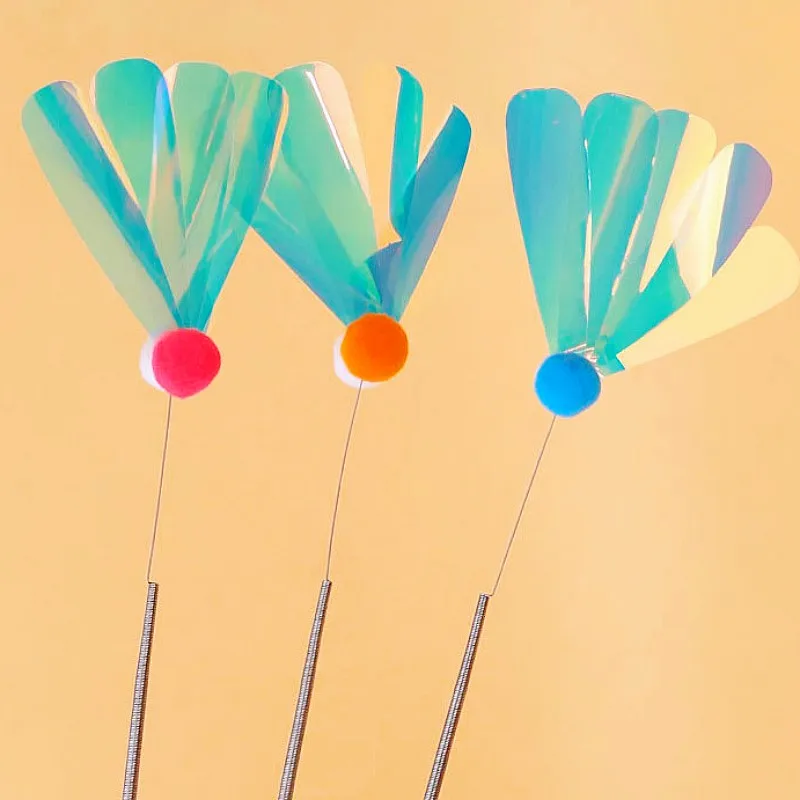 Juguete interactivo con plumas, muelle y campana para gatos - imagen 3