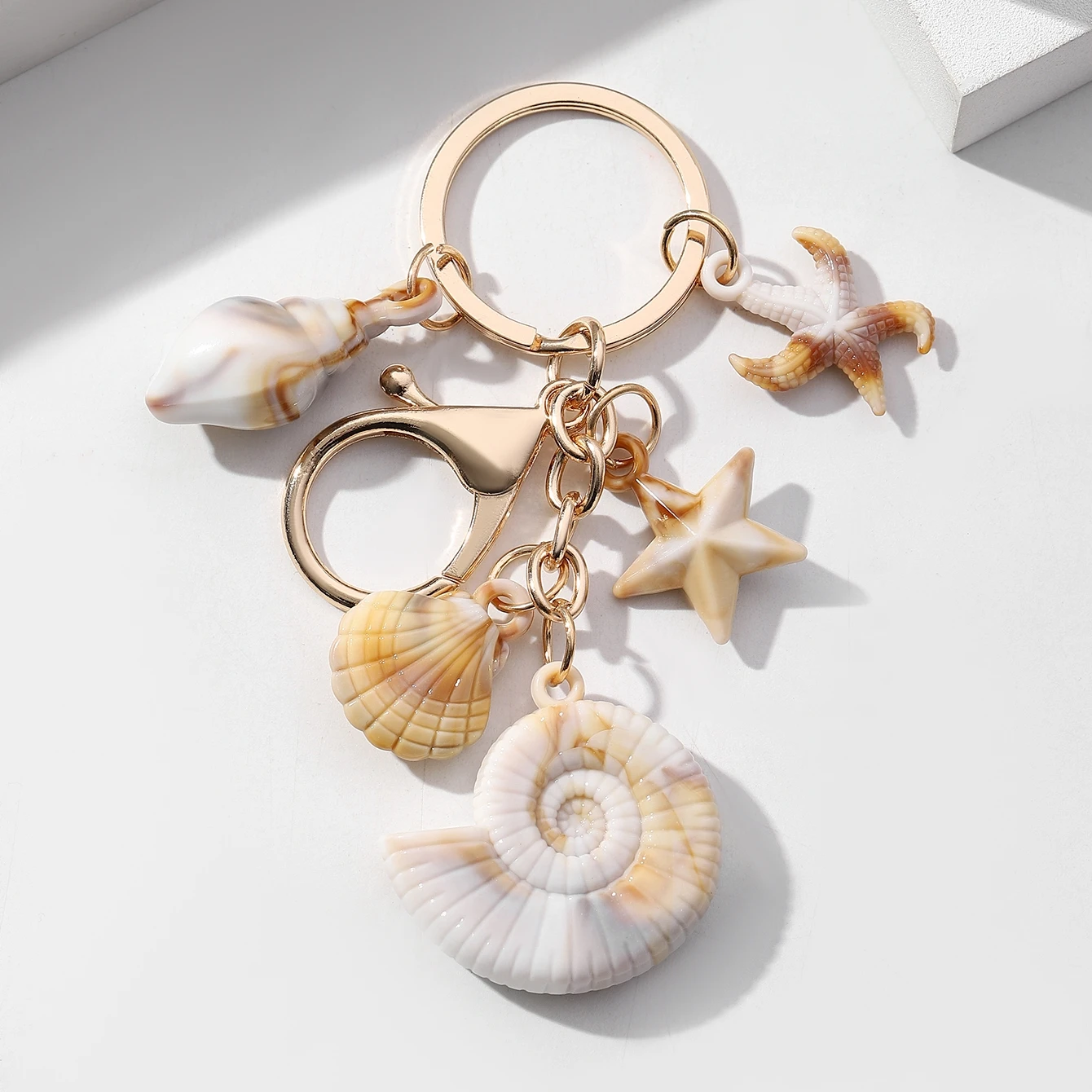 1 llavero de concha de estrella de mar de playa, bolso, colgante de llavero de coche, llavero colgante de decoración para familiares y amigos - imagen 4