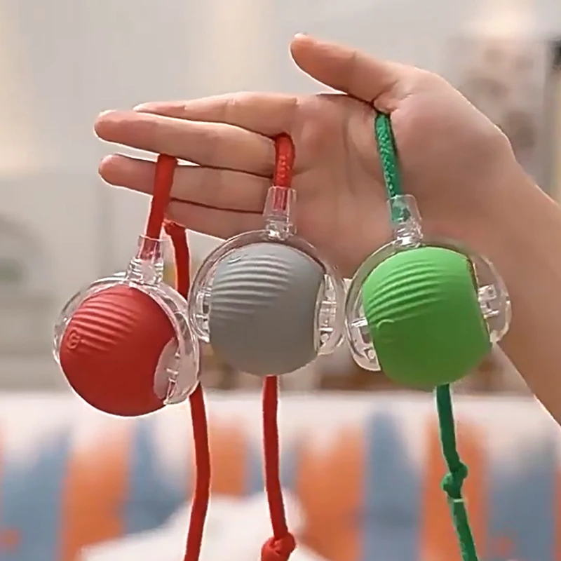 Pelota automática interactiva para gatos antimordidas con cuerda