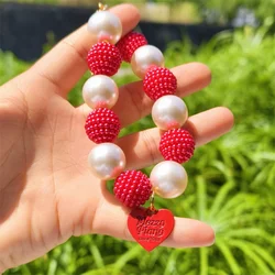Collar ajustable con perlas y colgante corazón para perros