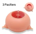 Pink three pacifiers