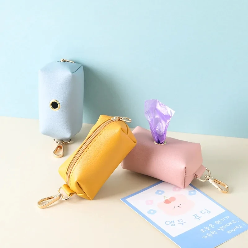 Nuevo dispensador portátil para perros y mascotas, bolsa para recoger, puede colgar cuerda de tracción, bolsa de almacenamiento para perros, enviar un rollo de bolsas de basura - imagen 5