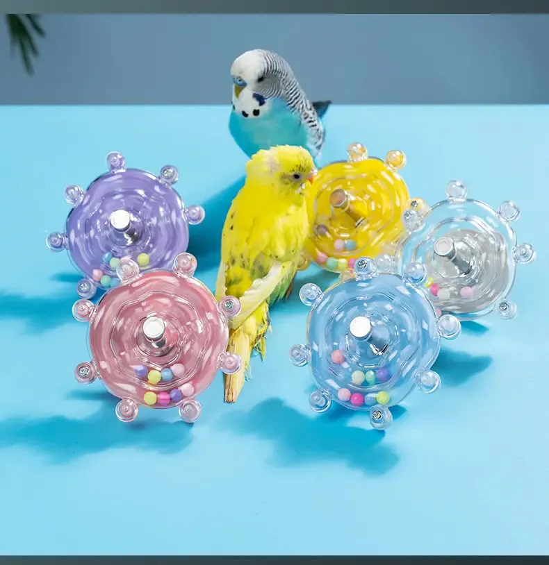 Juguete dispensador giratorio para loros: estimulación mental y diversión - imagen 2