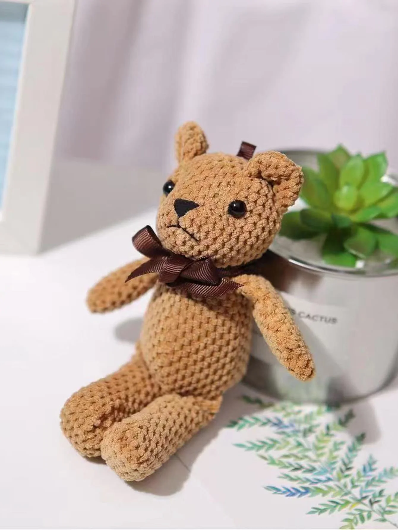 Osito de peluche con lazo – Juguete interactivo para perros y gatos - imagen 4