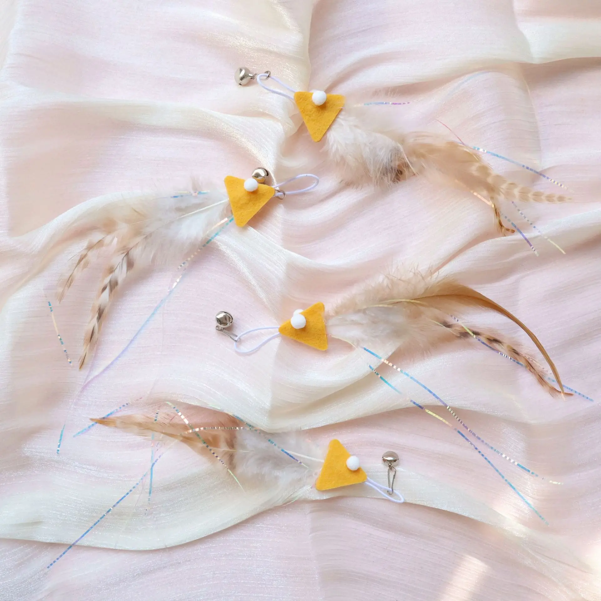 Varita para gatos con plumas de pez y cabezas intercambiables