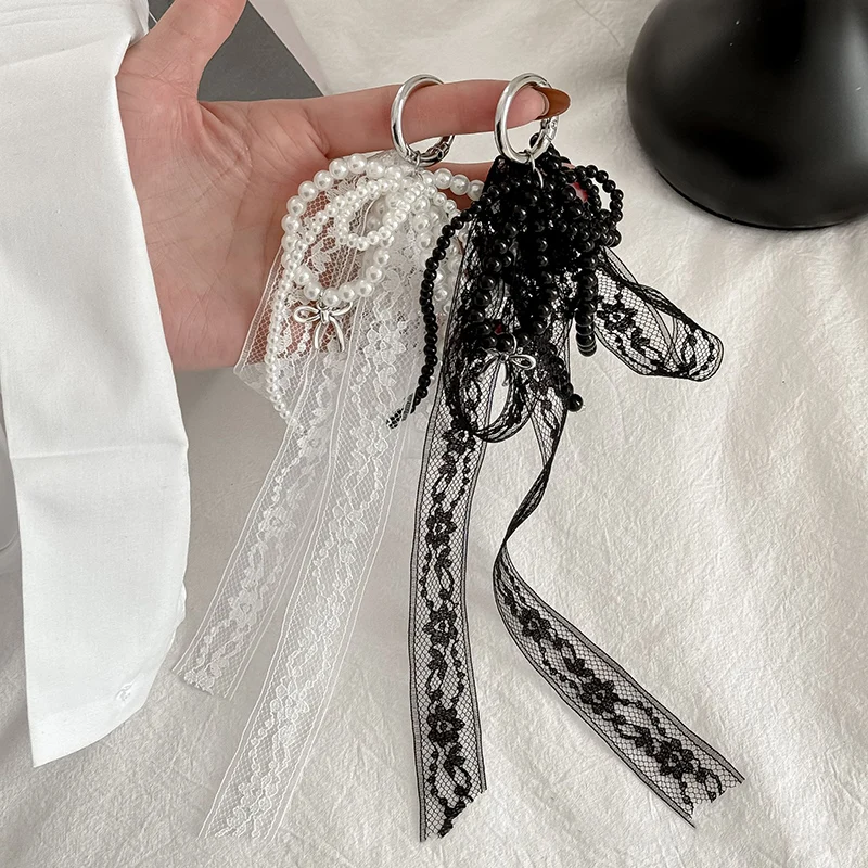 LLavero con lazo de encaje de perlas de imitación, llavero con colgante de cuentas dulces para mujer, bolso y mochila, llavero, adorno exquisito