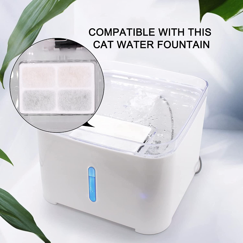 Gato bebiendo agua filtrada de fuente limpia