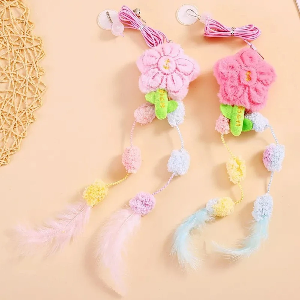Juguete interactivo para gatos elástico con pluma, campana y colgante - imagen 3