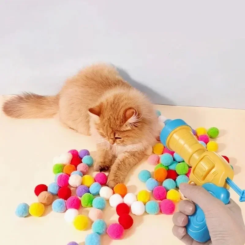 1 Juego de pistola de peluche para gatos, lanzador de felpa, herramienta interactiva silenciosa, Mini juegos de pistola de tiro, pelota de peluche elástica, juguetes, suministros para mascotas - imagen 2