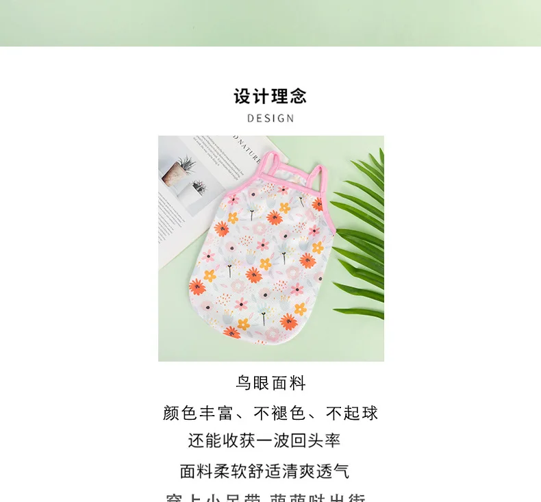 Un diseño de flores rosa y blanco en un babero