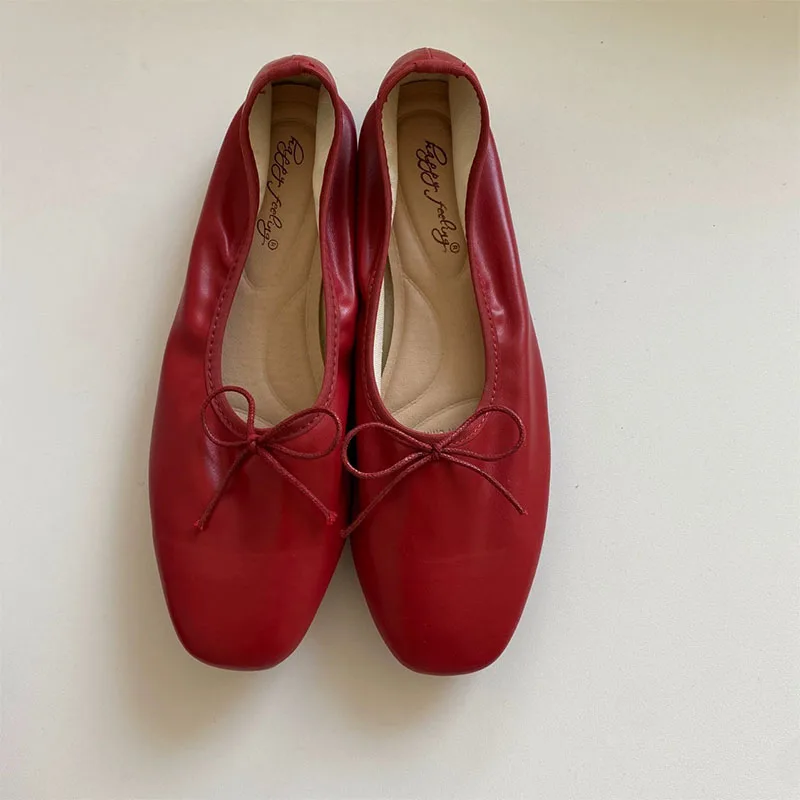 Suela flexible de los zapatos planos TULX