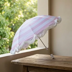Parasol para mascotas a rayas con flecos ligero para terraza