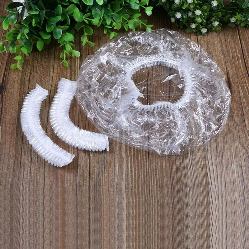 Gorro de ducha desechable transparente