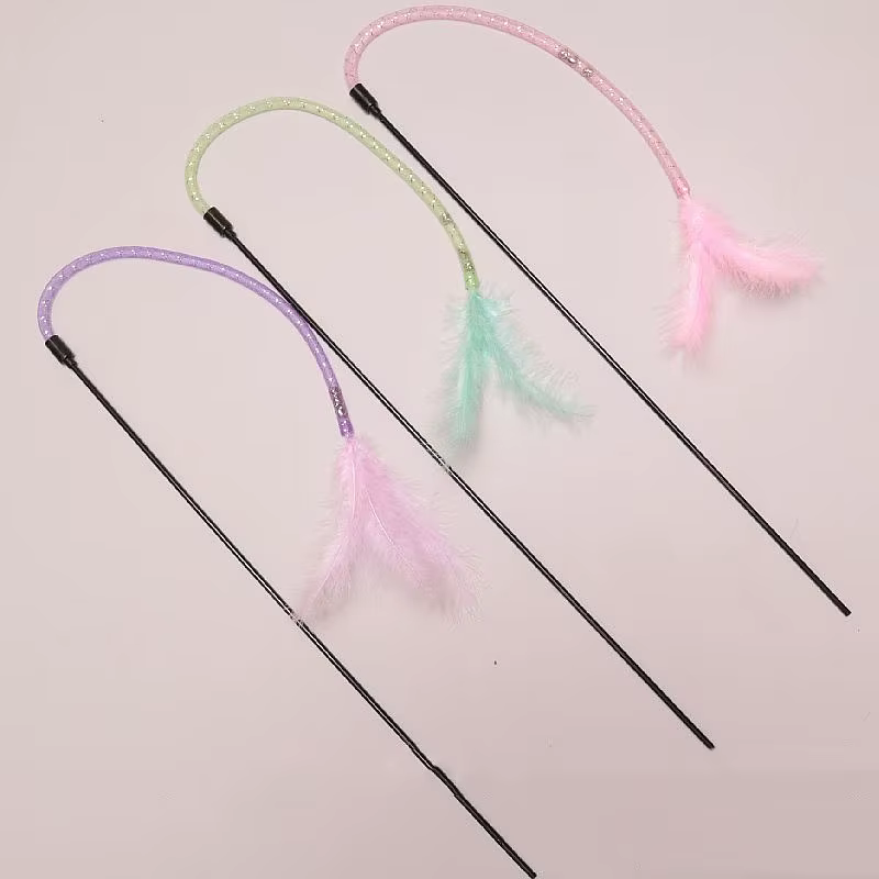 Juguete interactivo para gatos con plumas y campana - imagen 2