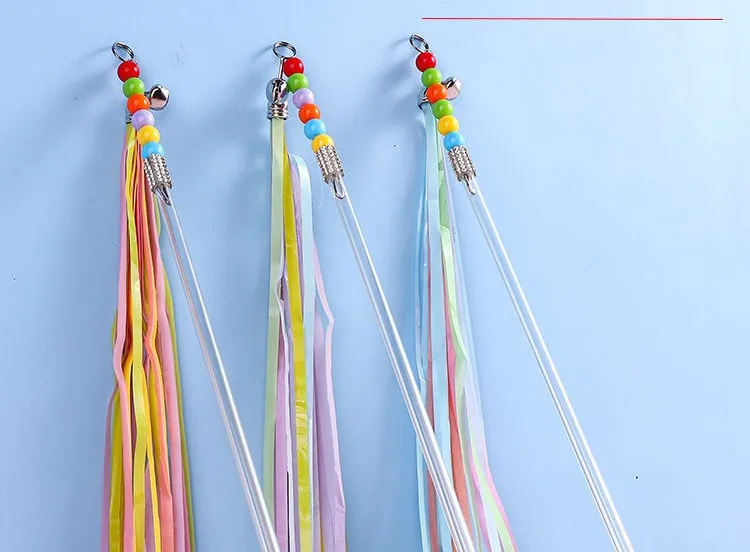 Juguete interactivo con plumas multicolores