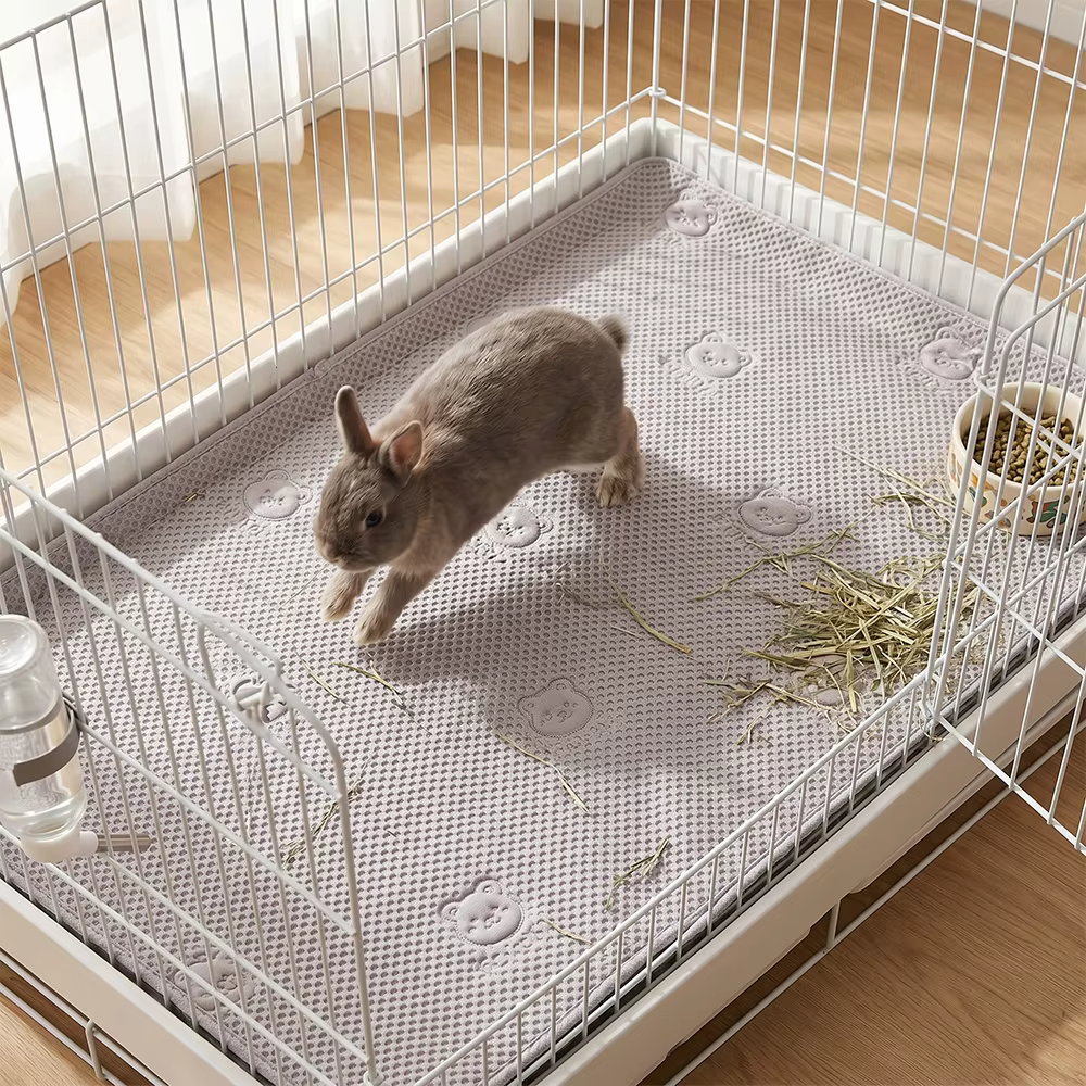 Almohadilla impermeable absorbente para conejos y hámsters - imagen 5