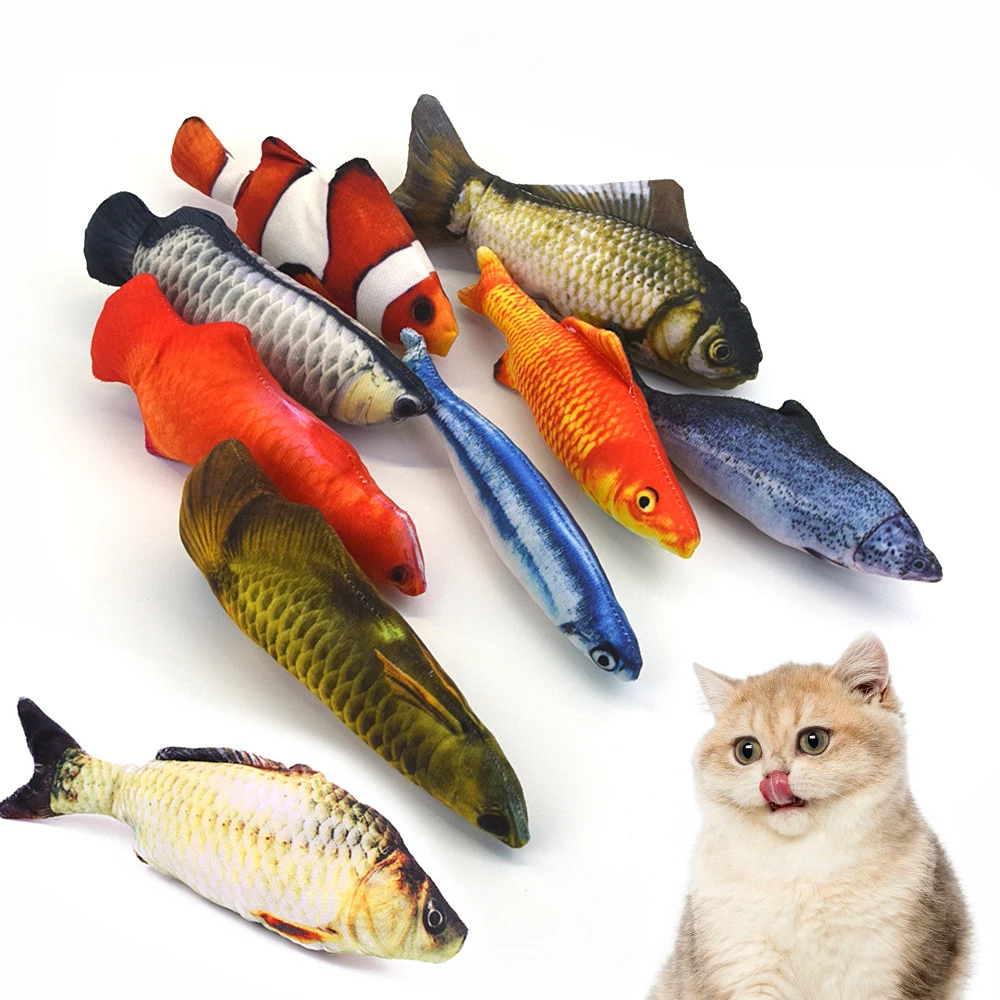 Juguete de pez peluche para gatos en suelo