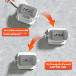 Soporte de pared resistente con adhesivo para escobas y fregonas