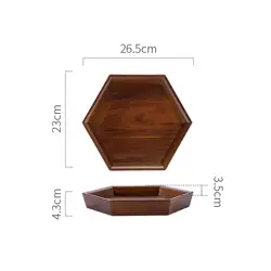 Bandeja de servir en madera oscura con diseño facetado