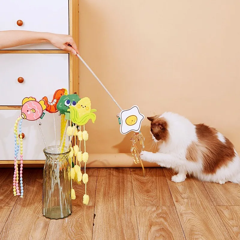 Juguete interactivo para gatos con plumas y campana resistente