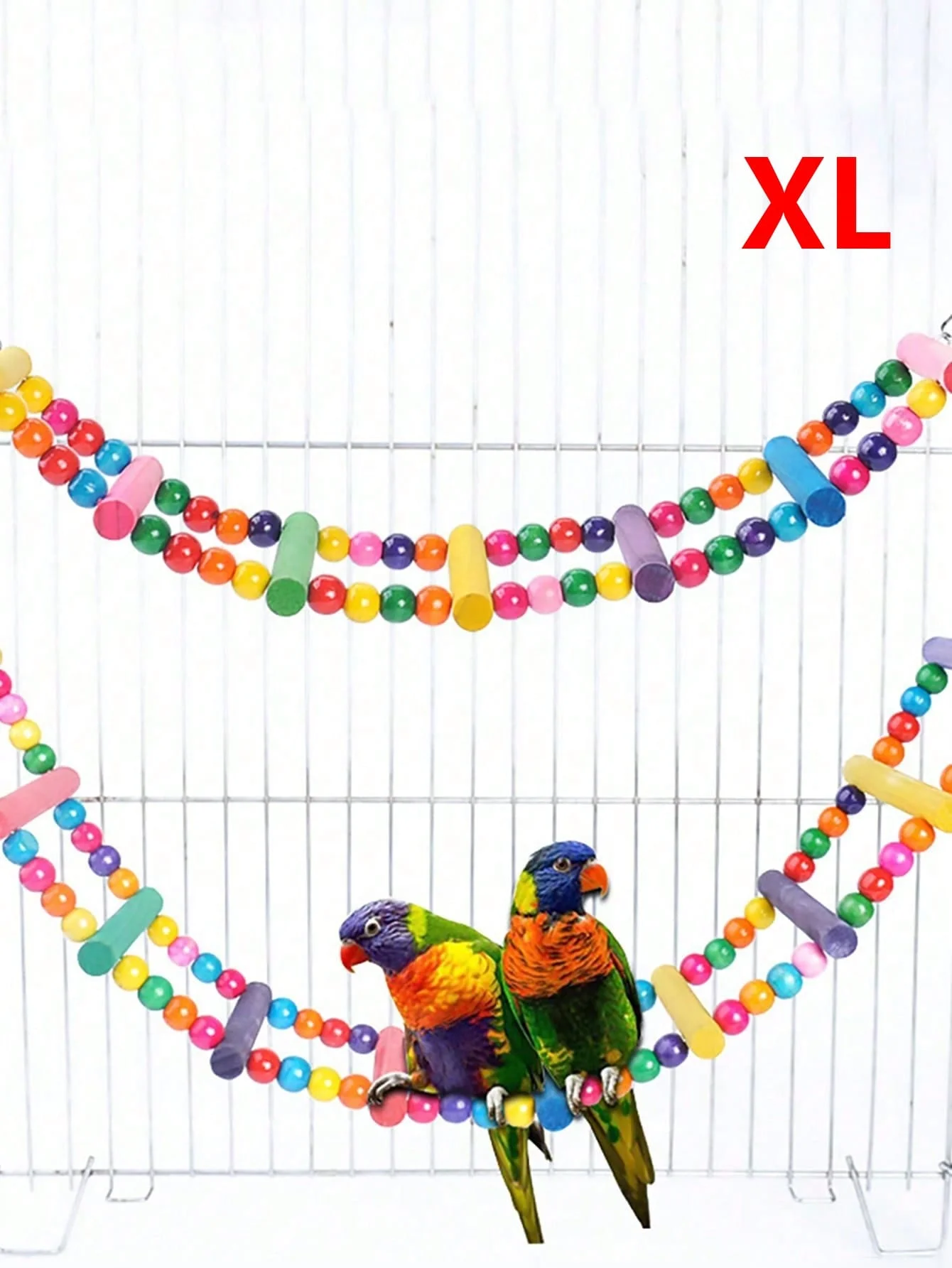 Juguete instalado en una jaula de pájaros