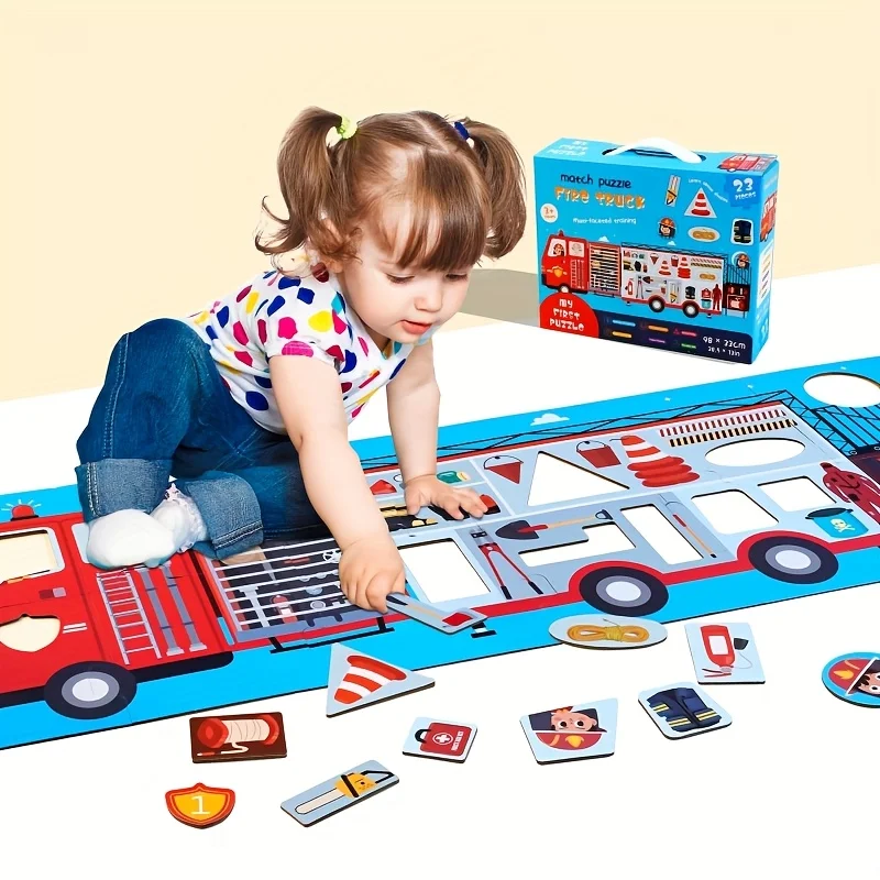 Vista del camión y elementos del puzzle gigante