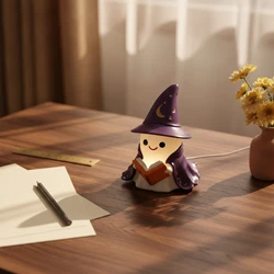 Figura Decorativa Fantasma Mago con Libro Brillante – Adorable para Mesa de Noche