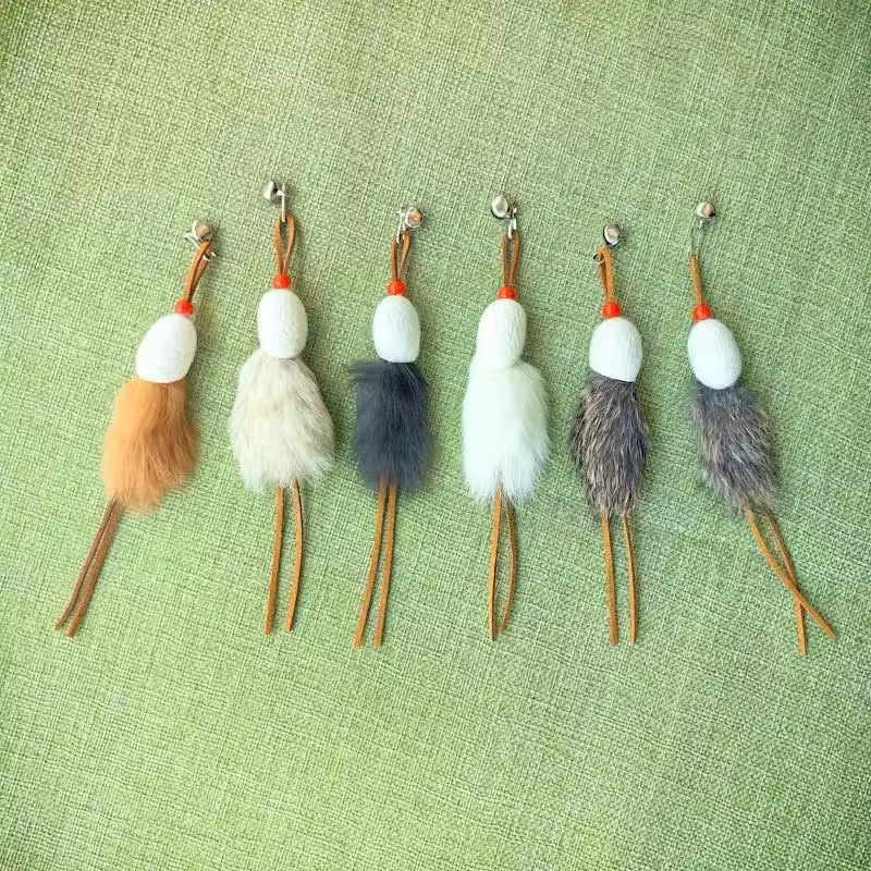 Juguete para gatos: varita de peluche con cabezas intercambiables