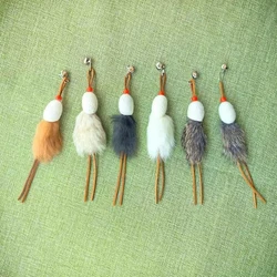 Juguete para gatos: varita de peluche con cabezas intercambiables