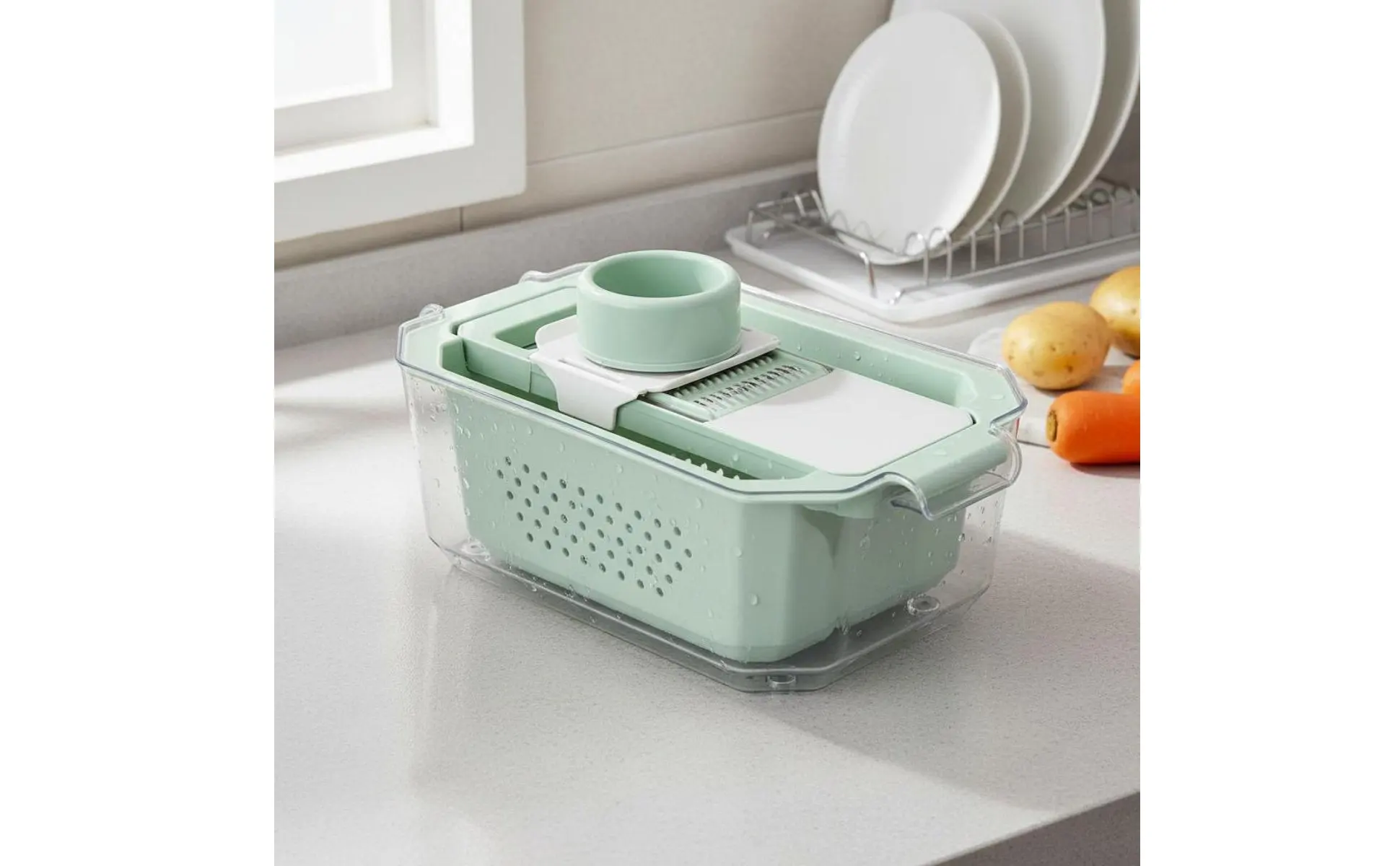 Cortador de verduras con contenedor y base antideslizante