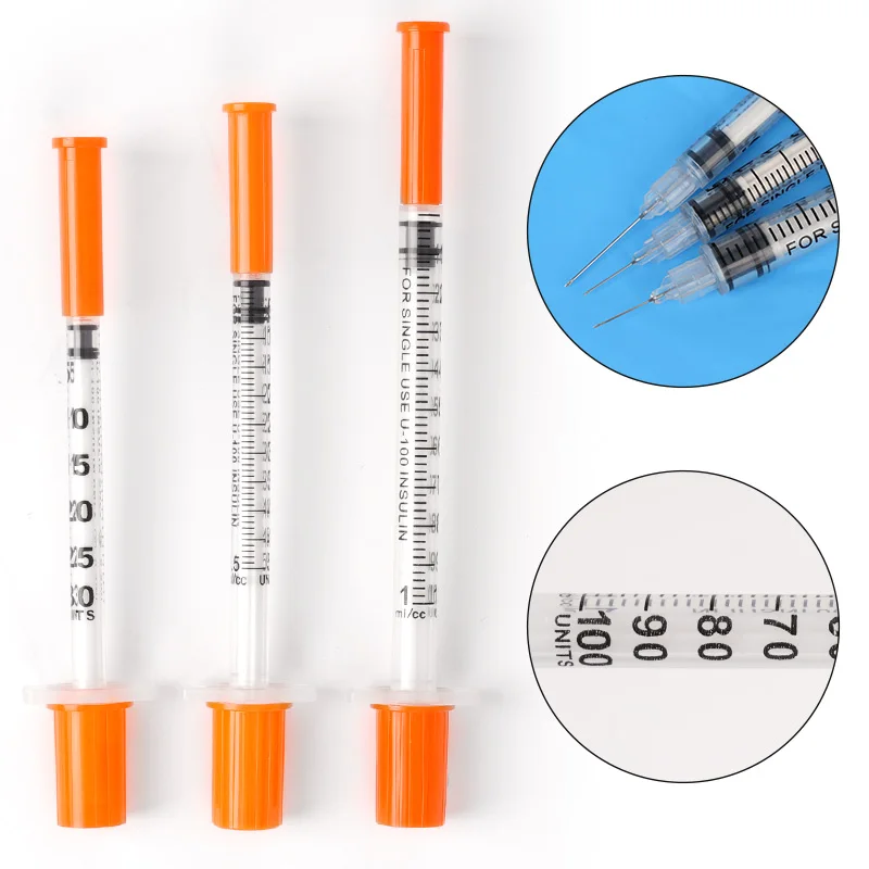 Jeringa veterinaria de plástico con tapa naranja y aguja de 13 mm